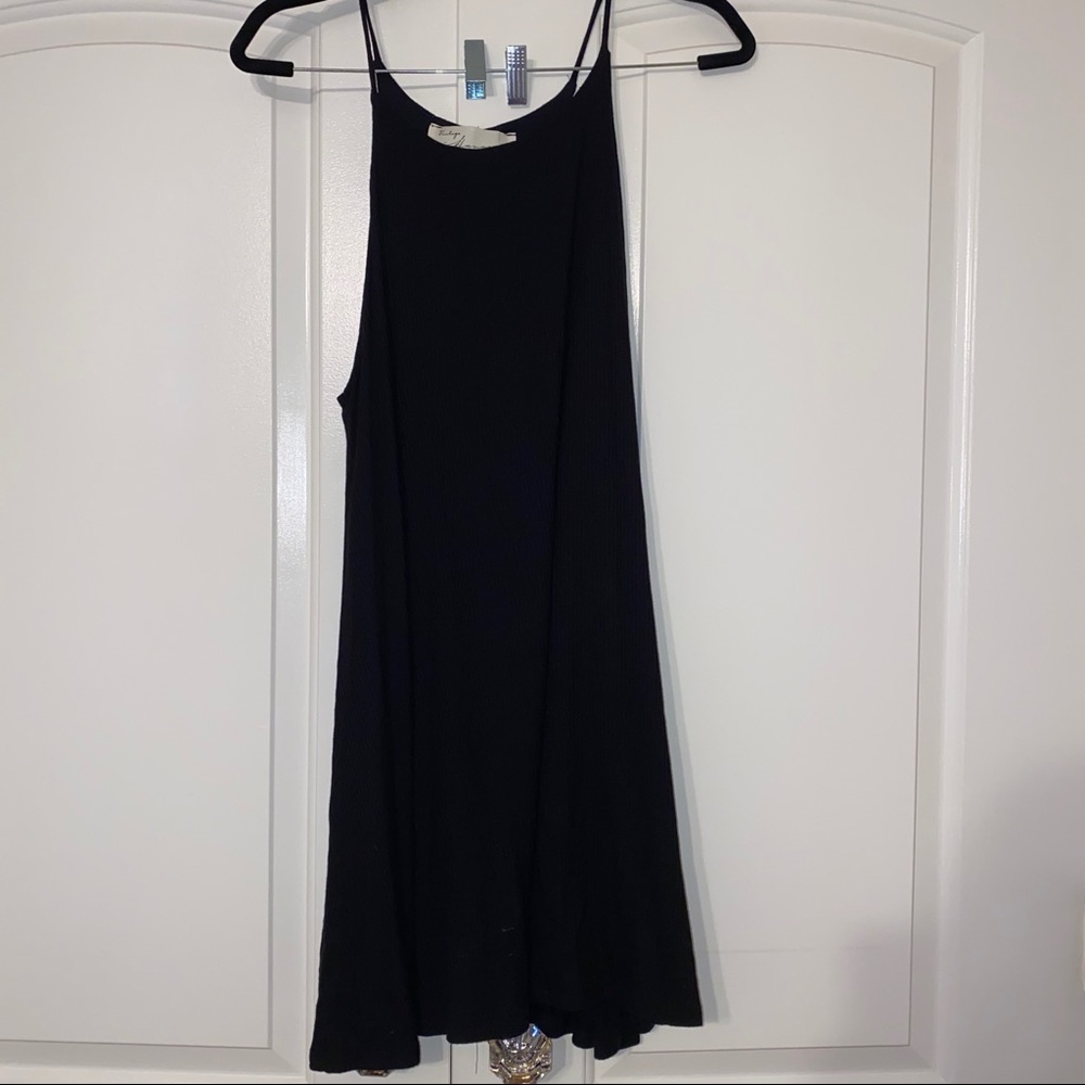 black ripped flowy mini dress